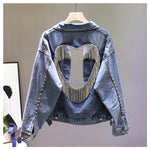 Denim jacket with diamond tassels